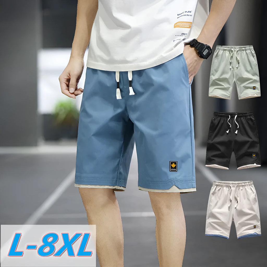 Casual loose-fit beach shorts in green with a straight cut and elasticated waistband