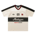 Apricot-coloured loose fit sports T-shirt with a printed letter design and drop-shoulder sleeves.