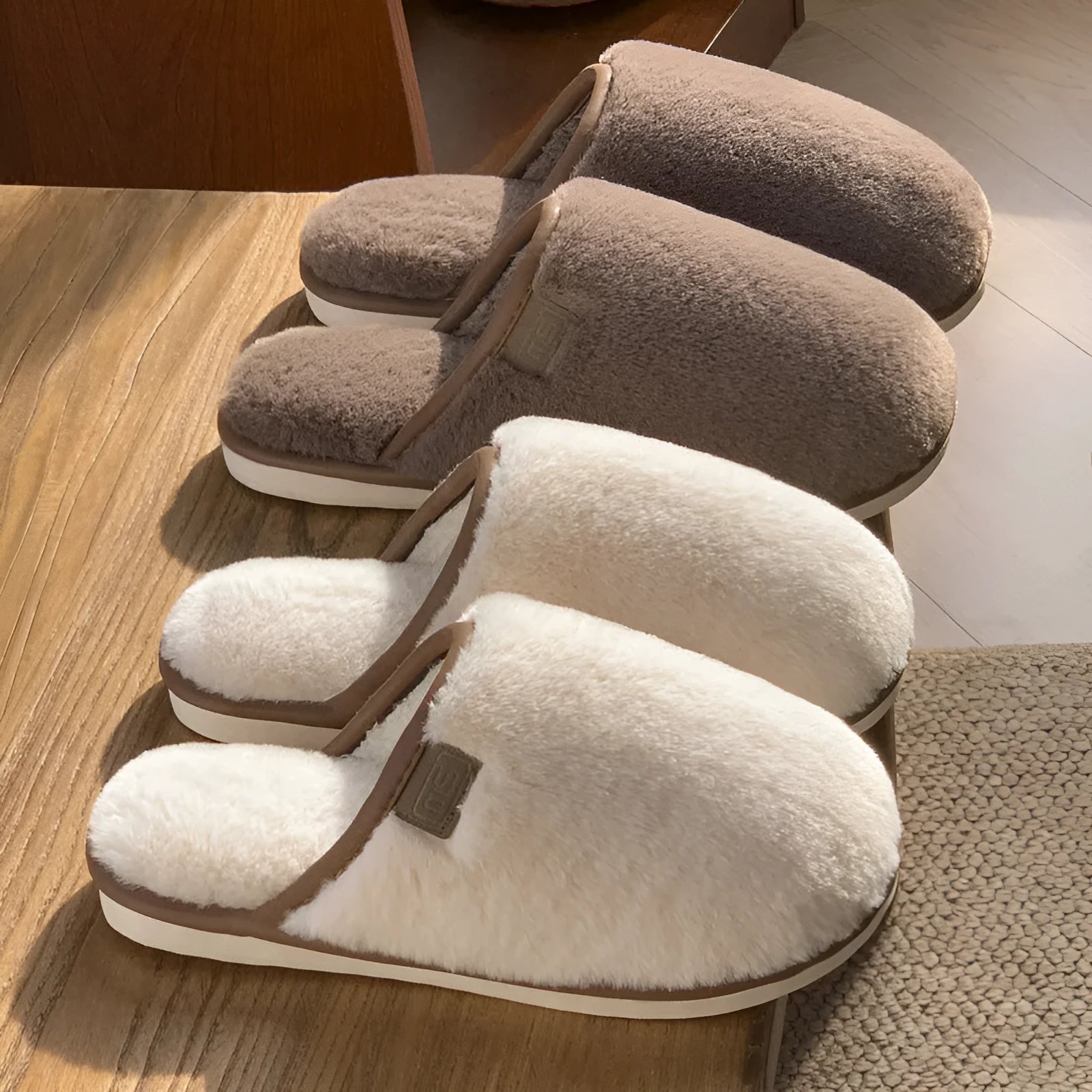 Pair of solid colour plush PVC winter slippers with non-slip soles for home use.