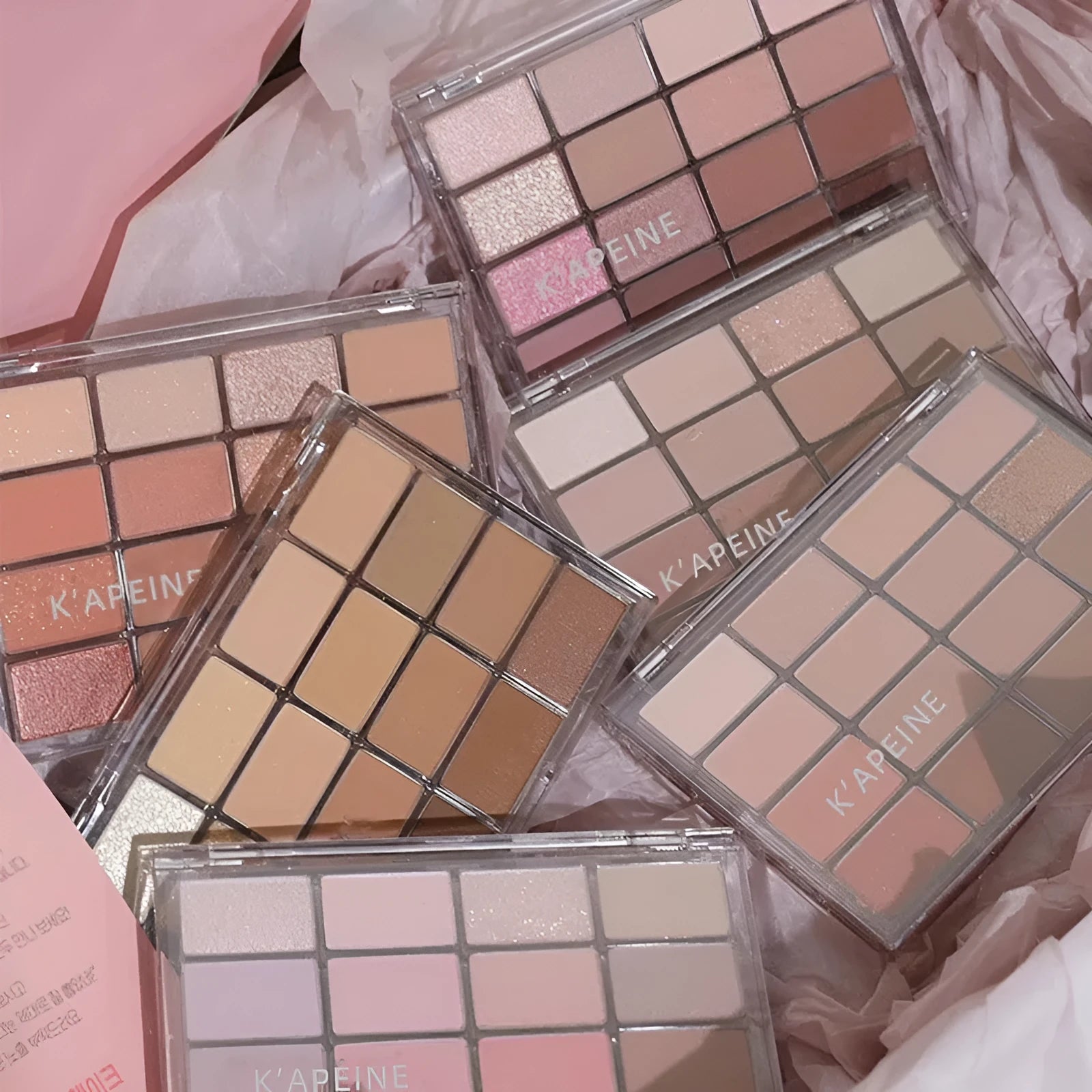 Crouching Silkworm 16-colour eyeshadow palette showing pink and brown shimmer and matte shades