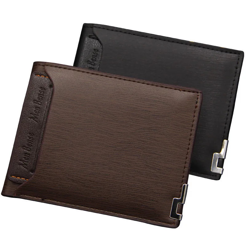 Men's black iron-edge card-picking wallet holding banknotes and cards next to a mobile phone