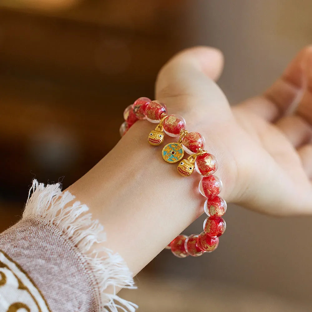 Handmade national style swallow gold beast bracelet in colourful fragrant grey gold foil coloured glaze glass