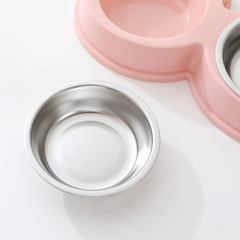Stainless steel frog design pet bowl with separate food and water compartments in blue, green, and pink colour options