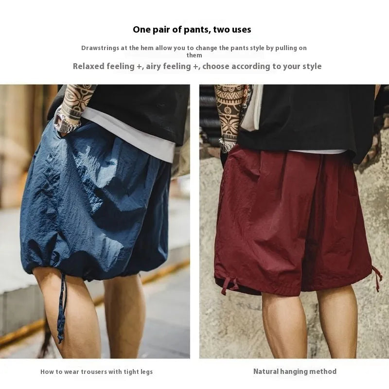 Men's Prussian Blue nylon shorts with embroidered design and elastic waistband
