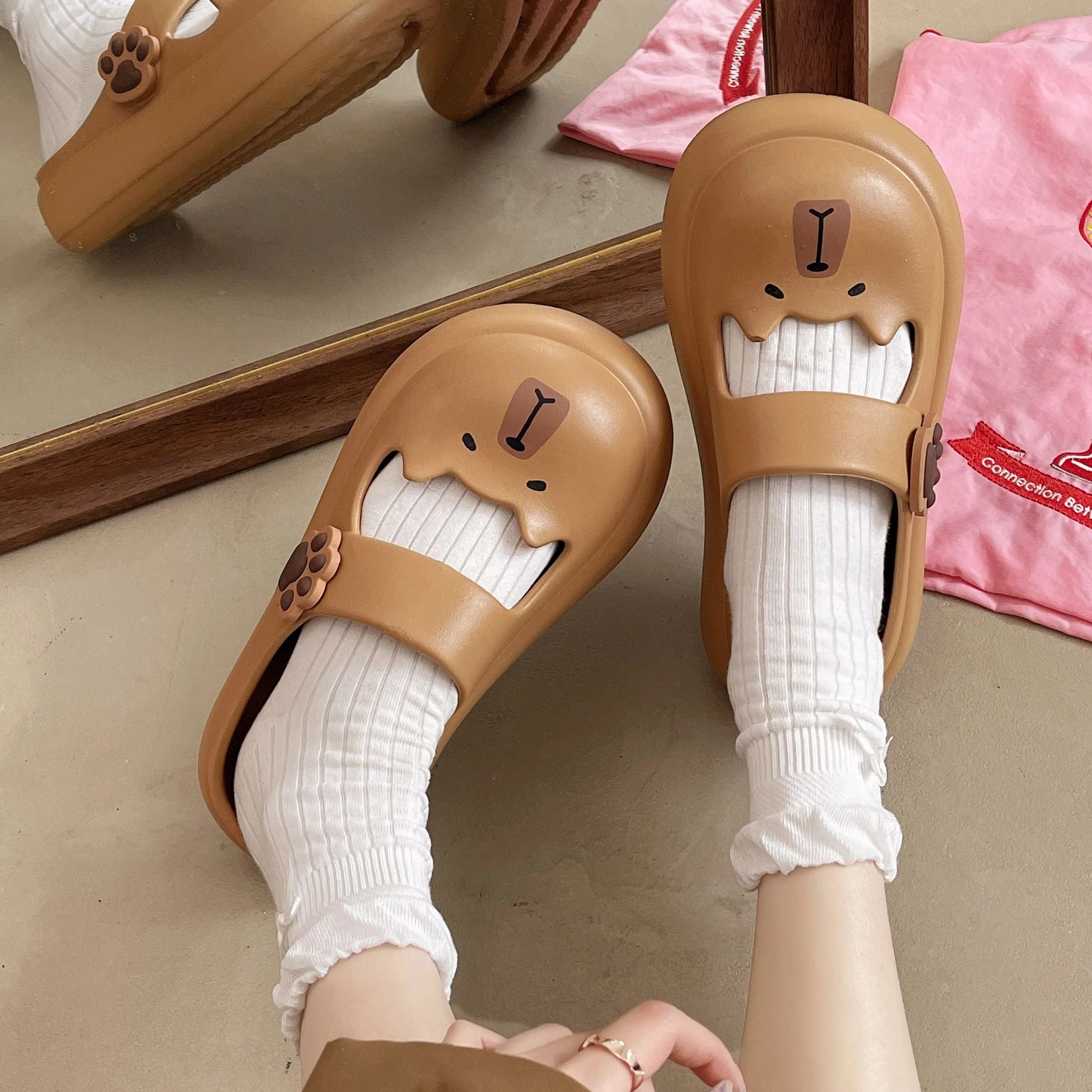 Cartoon closed-toe EVA slippers in white with thick non-slip sole