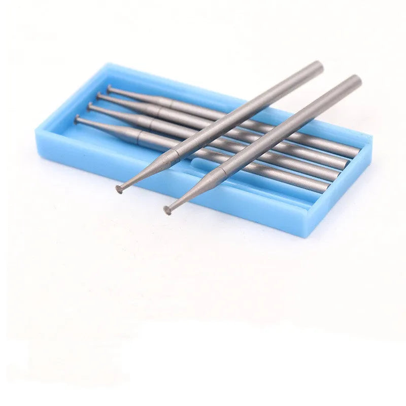 Blue box containing six thin disc needle-shaped tungsten steel carving cutter grinding heads with sizes from 1.0mm to 2.0mm.