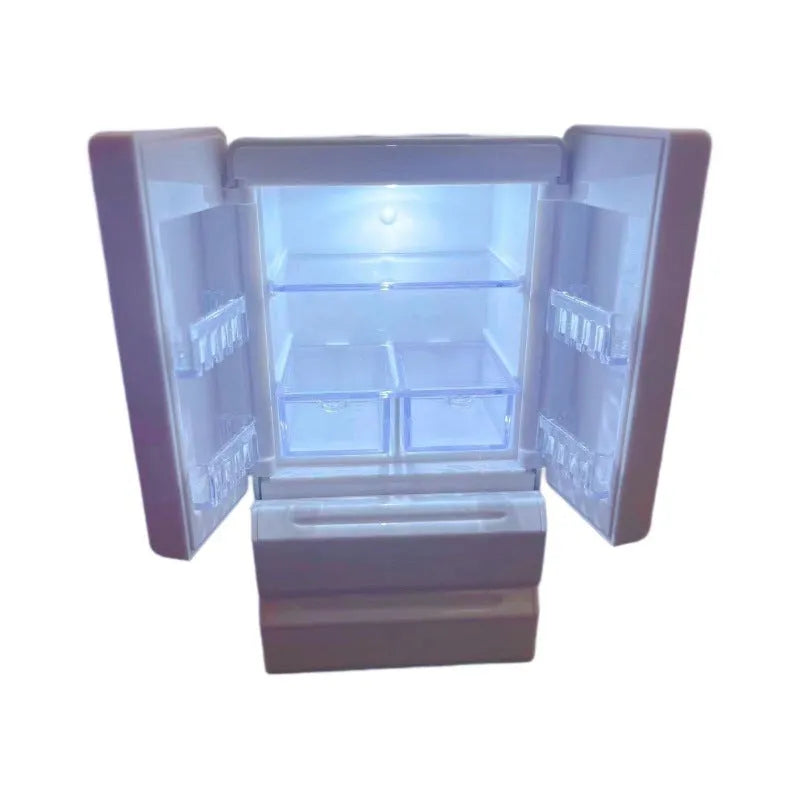 White plastic miniature candy shop toy model with illuminated interior window.