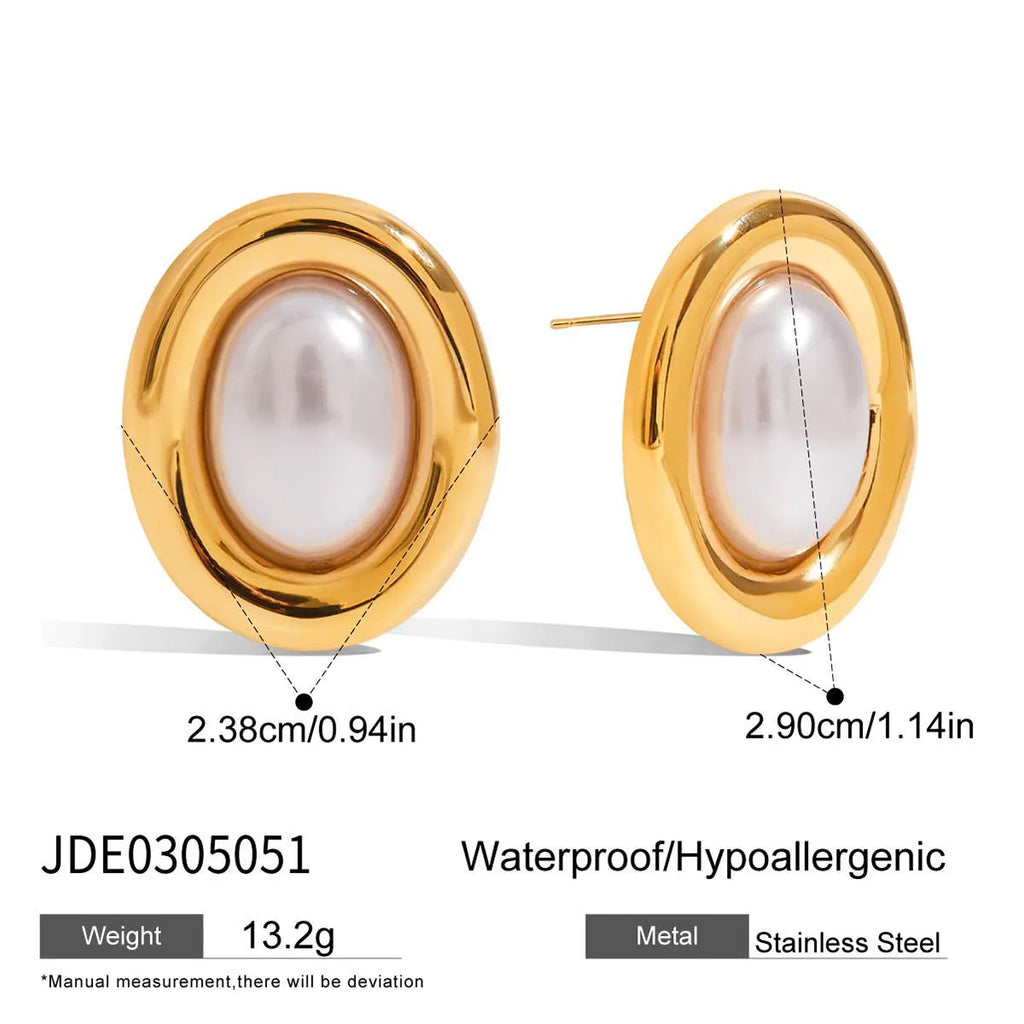 A pair of stainless steel vintage pearl stud earrings with a silver-tone electroplated finish.