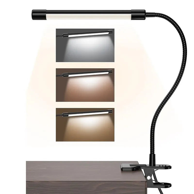 Black and white USB-powered LED desk lamp with a 26 cm long adjustable gooseneck neck on a table.