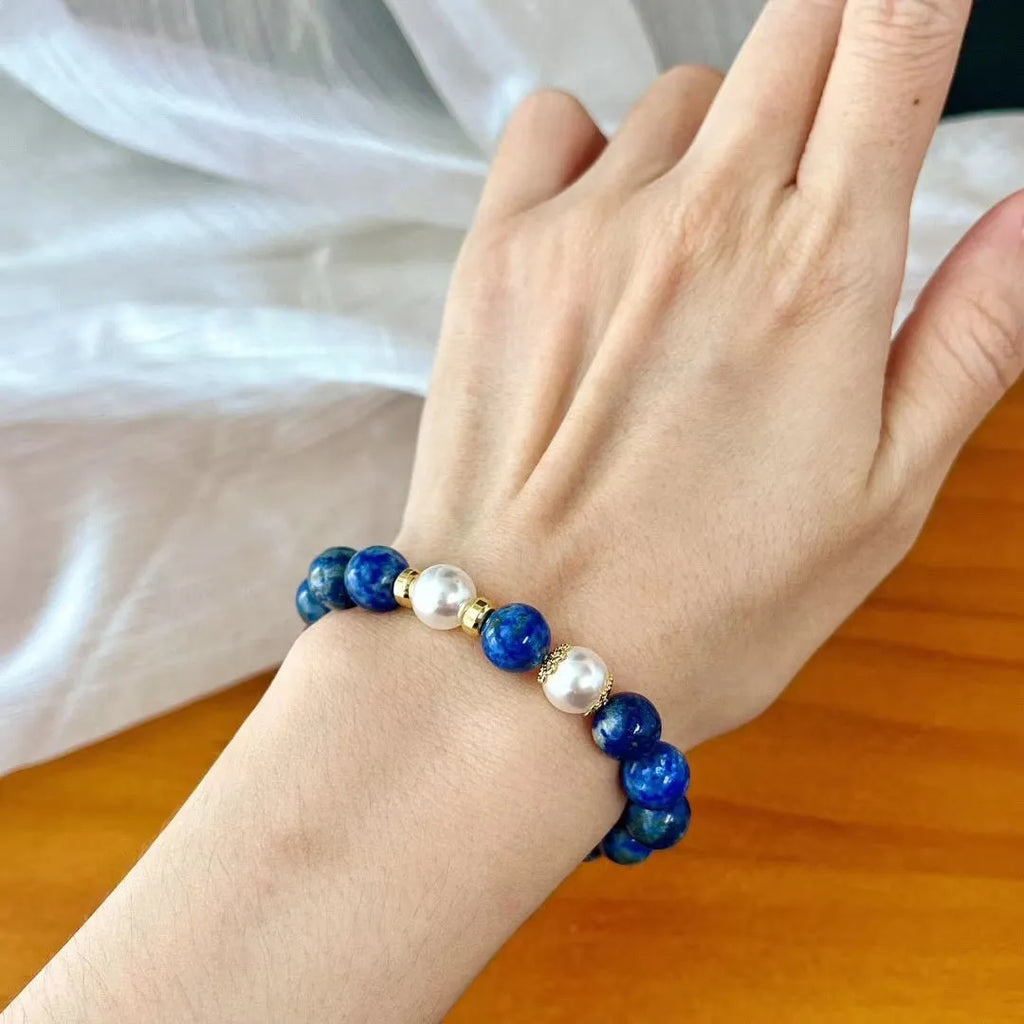 Chinese style lapis lazuli bracelet with green gold stone elements and artistic retro design