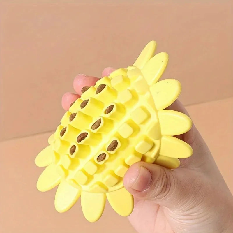 Yellow rubber sunflower dog toy for puppy teething with textured petal surface