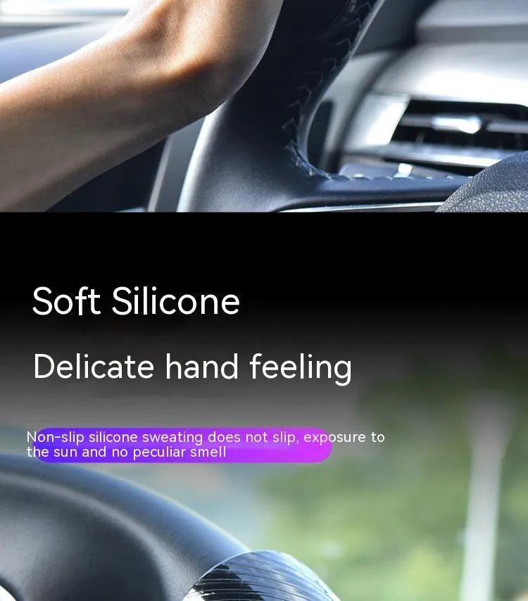 Black and blue steering wheel assist balls with silicone grip, showing approximate 9cm by 6cm size.