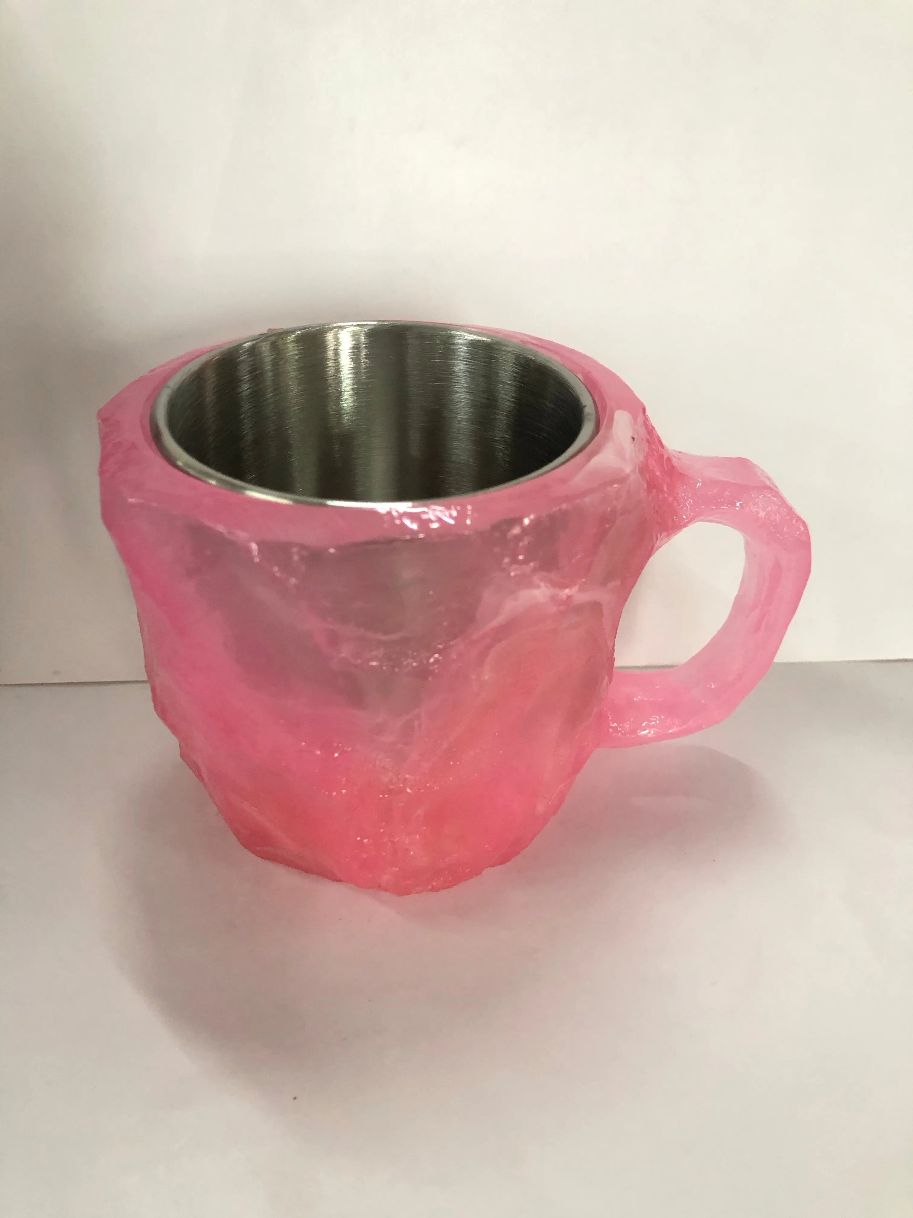 Purple resin mineral crystal coffee mug with handle showing 3D texture and 10cm height