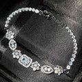 Women's S925 sterling silver-plated bracelet with white gold finish and inlaid zircon stones.