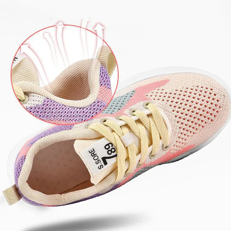 Casual colourblock lace-up sneakers for women with blue mesh upper, round toe, and white sole on a light background