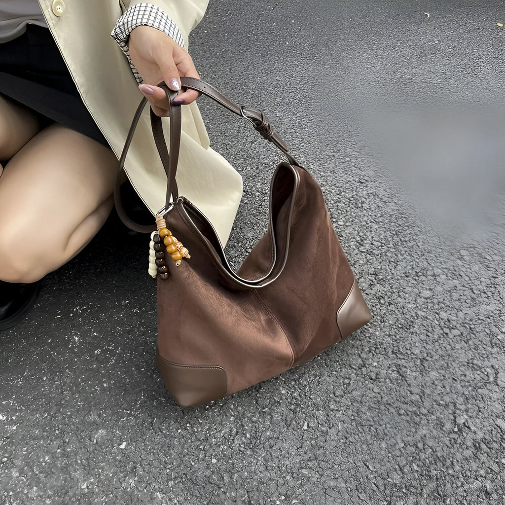 Women's PU leather retro shoulder crossbody bag in brown with ribbon pendant, horizontal shape, sandwich pocket