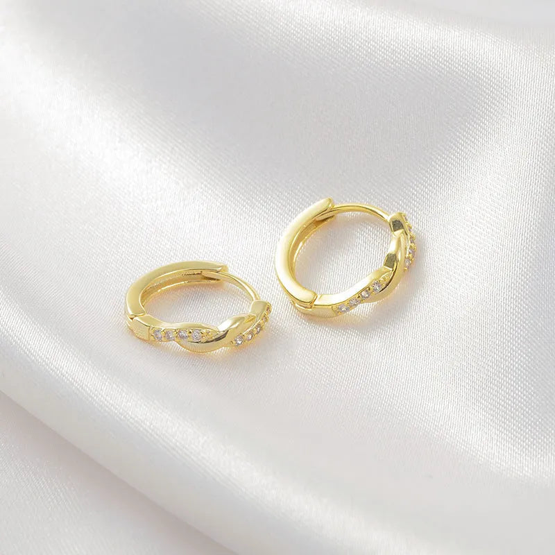 Geometric hemp rope interwoven earclip earrings in gold colour with diamond treatment surface
