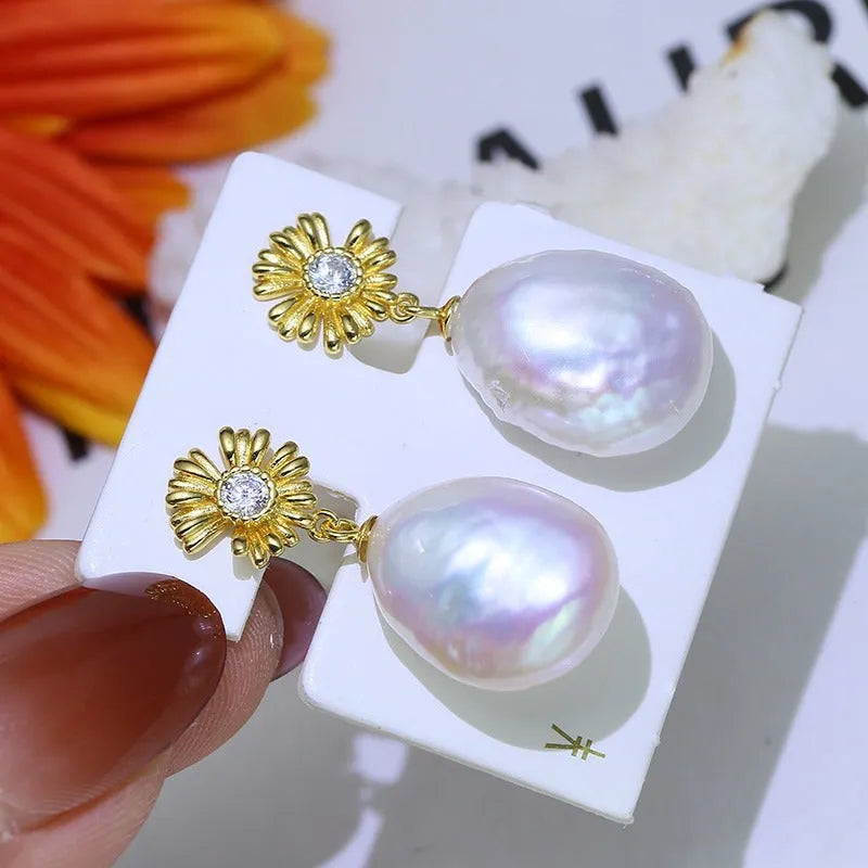 Baroque flower-shaped S925 sterling silver earring frames and a ring holder on a plain background.