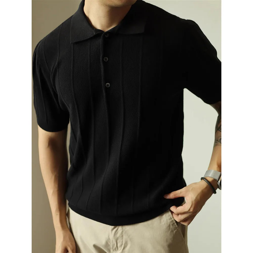 Men's solid black loose fit t-shirt on a hanger