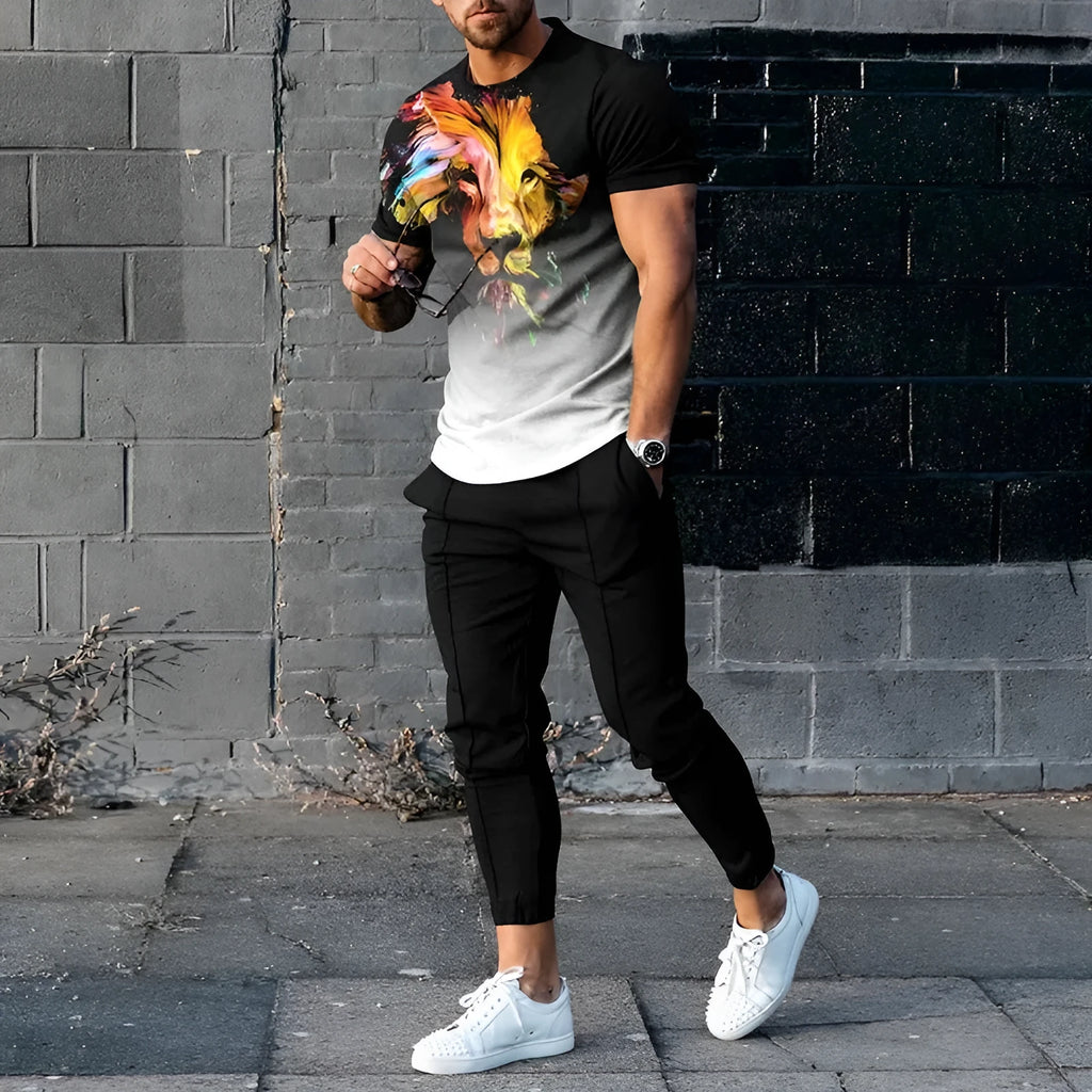 Man wearing a short-sleeved printed pullover and matching trousers from a lightweight polyester casual set.
