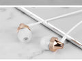 Auricular Metal Fever Heavy Bass Copper In-Ear Headphones in gold, silver, black, and red/black colours with braided cable.