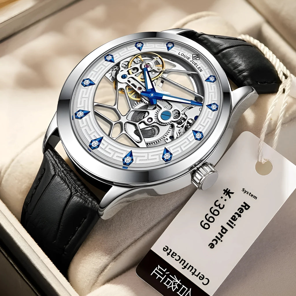 Men's silver case mechanical watch with white dial, blue hands, and black genuine leather strap.
