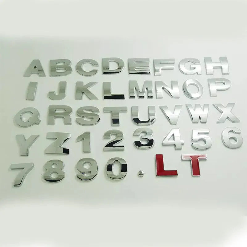 Zinc alloy 3D raised letter car sticker for bumper customisation in black or silver.