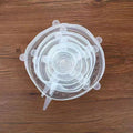 Set of six colourful silicone stretch lids in different sizes for covering food containers.