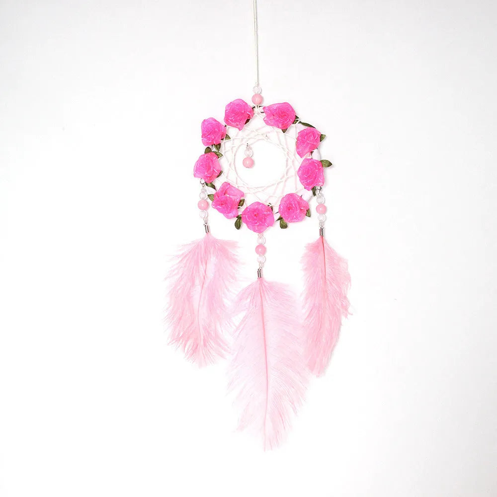 Pink ostrich feather dreamcatcher wind chime wall decoration measuring 10cm