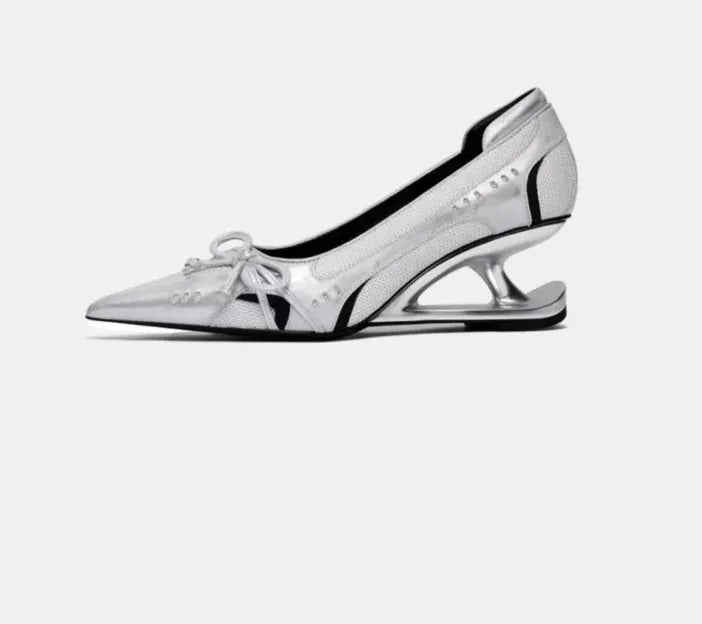 Black women's Mary Jane shoes with a pointed toe and a unique floating special-shaped heel.