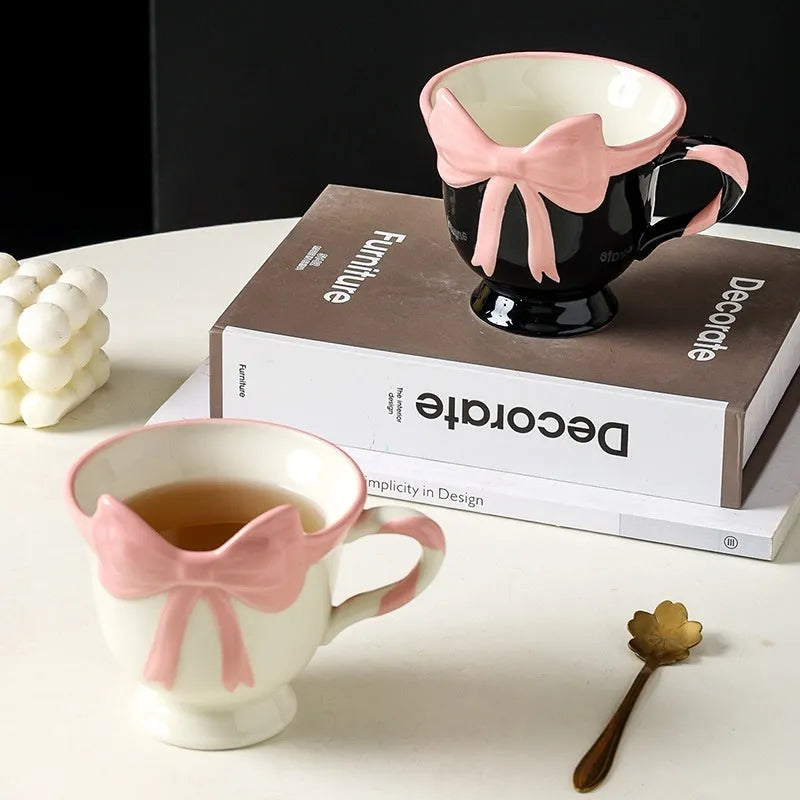 Ceramic mug with heart bow design in black pink colour, 301-400 ml capacity