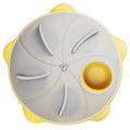 Yellow plastic cat puzzle feeder plate with four rotating balls for slow feeding.
