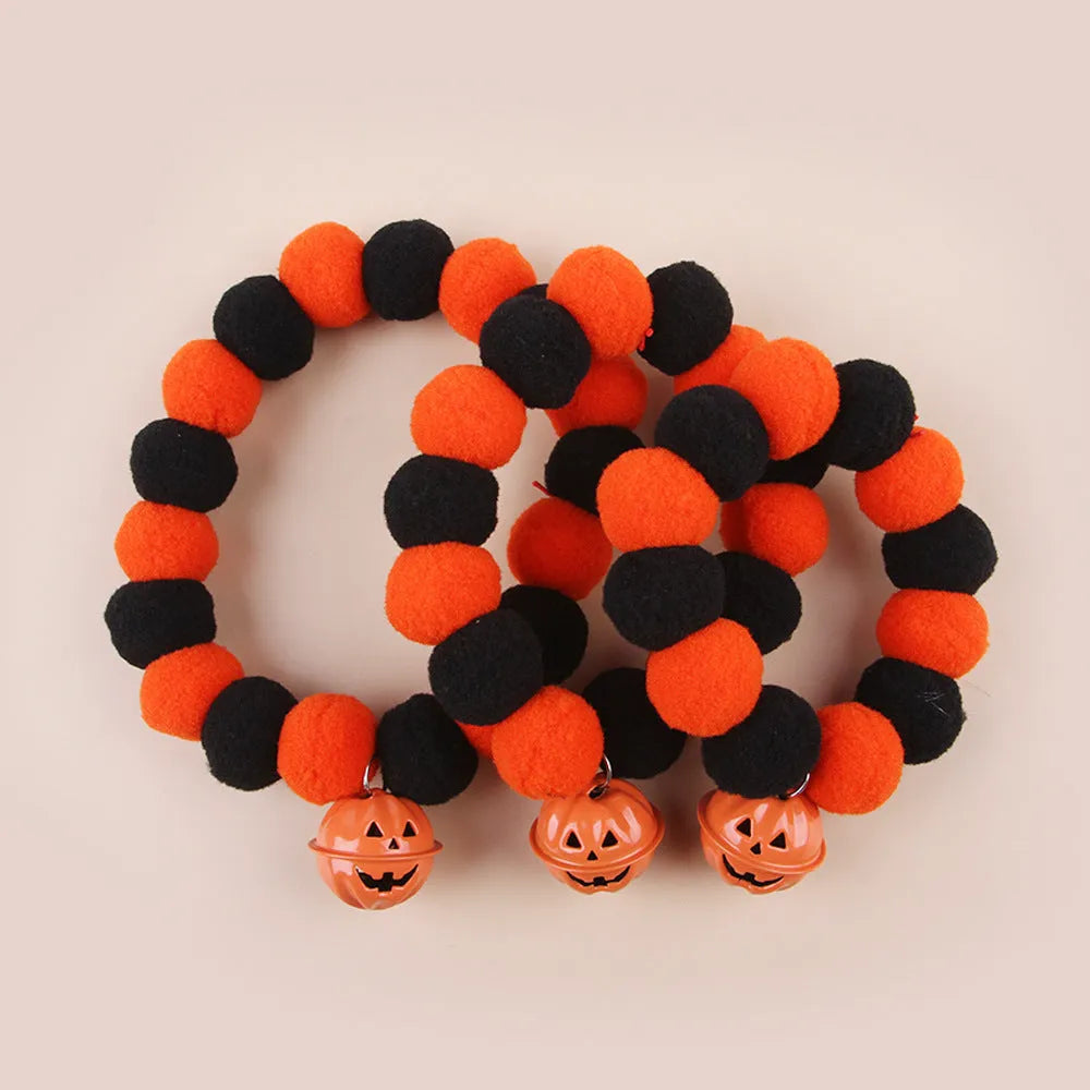 Orange Halloween pumpkin costume collar for cats with adjustable strap in sizes S, M, L.
