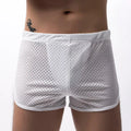 Men's black three-point boxer shorts on a white background showing mid-waist design.