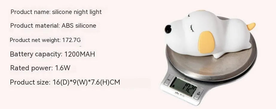 Cute two-colour cartoon dog silicone night lamp with USB cable for power.