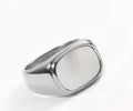 Silver white fashion ring with glossy finish and simulated diamond centre stone on light background
