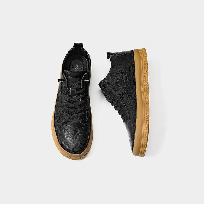 Men's black leather casual shoes with round toe, lace-up closure, and rubber soles