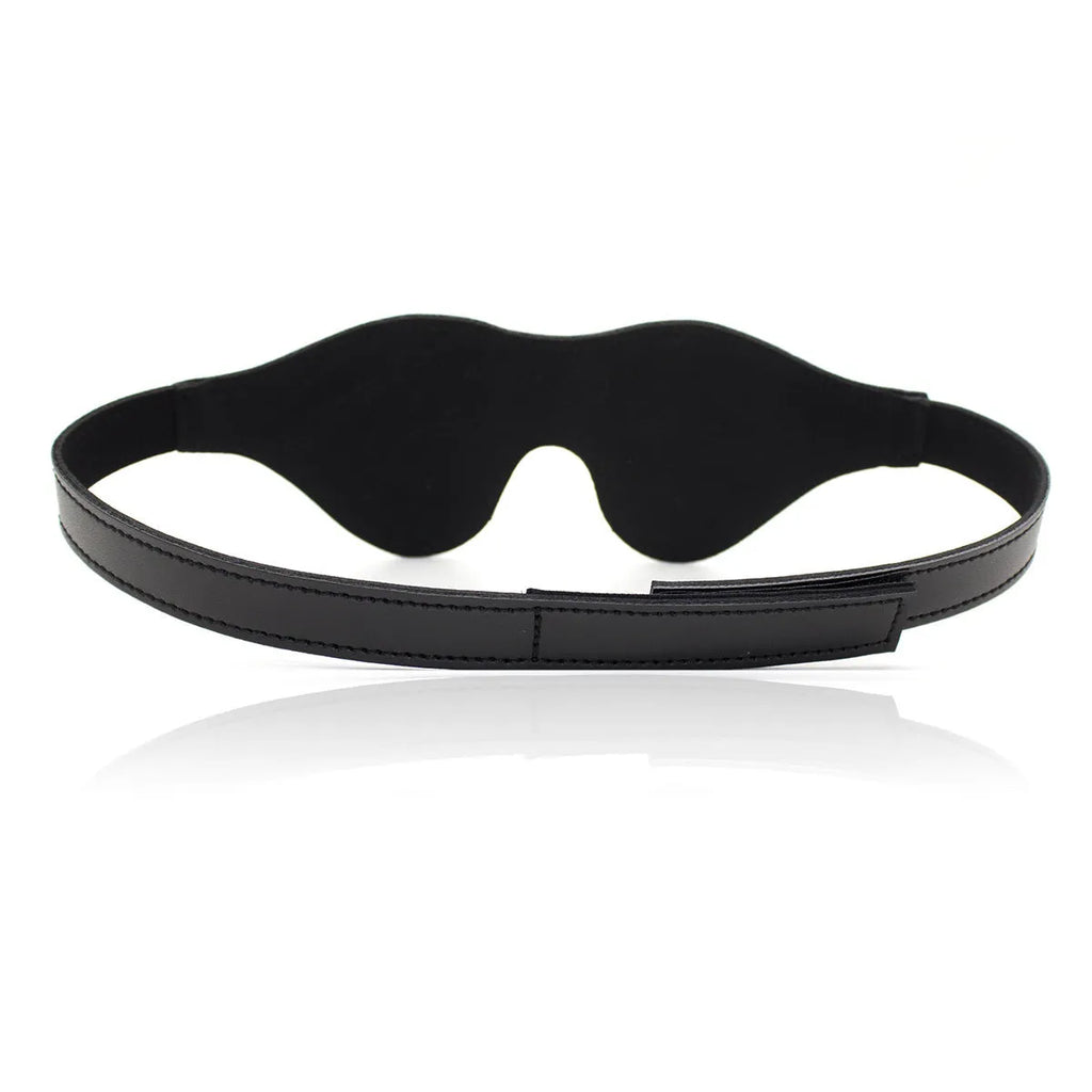 Women's leather eye mask with Velcro strap in black colour showing three-dimensional design