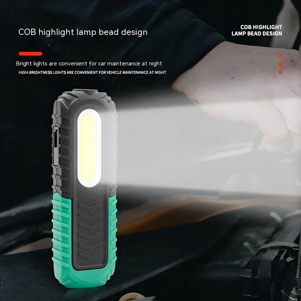 Black and green USB-charged auto repair work light with compact design for vehicle maintenance