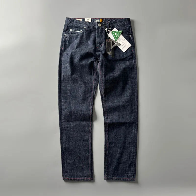 Men's straight leg denim jeans in a primary colour, showing front view of the mid waist and classic cut.