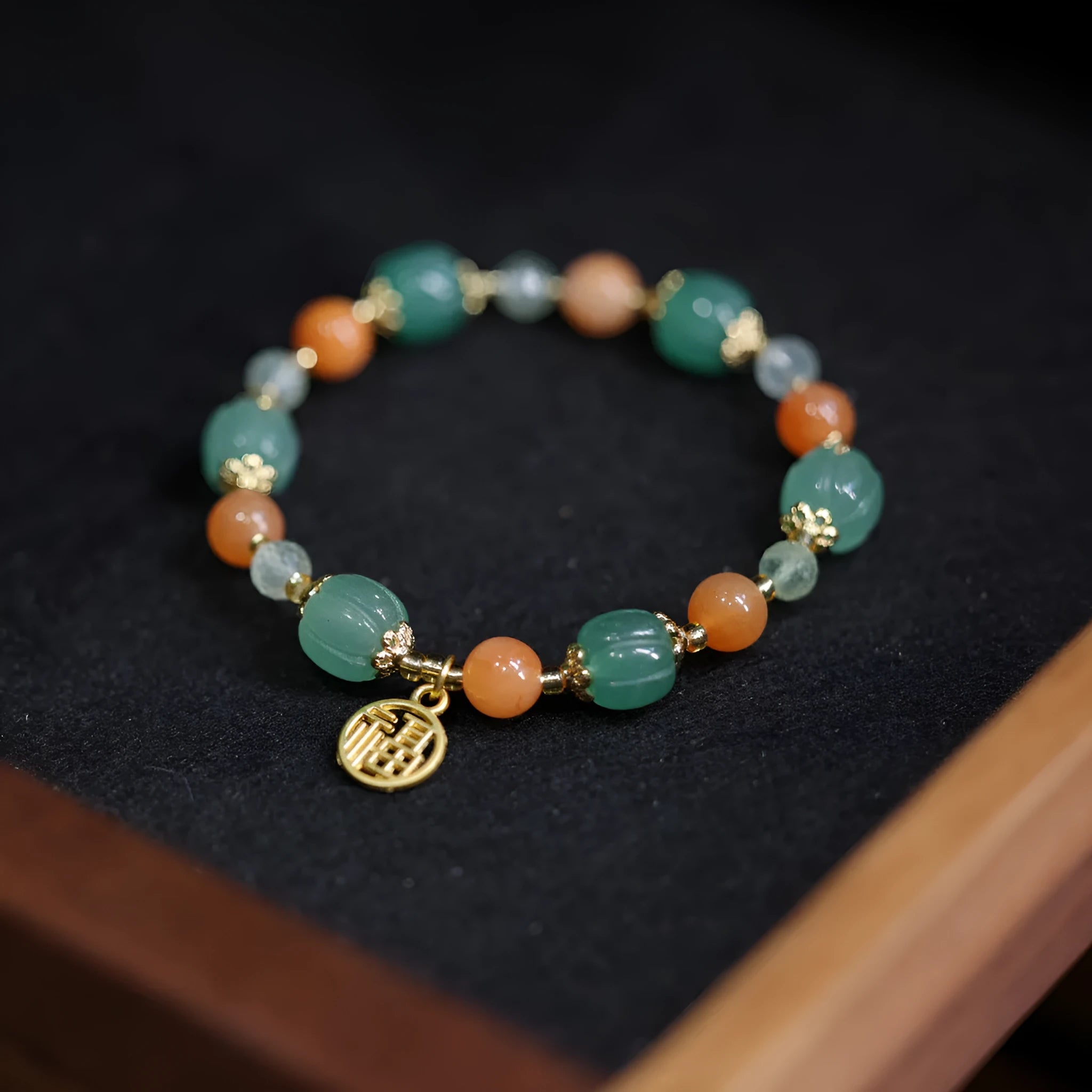 Duobao pumpkin bracelet for women with Jinsi Jade barrel beads and hanging charm on 14-16.5cm wrist