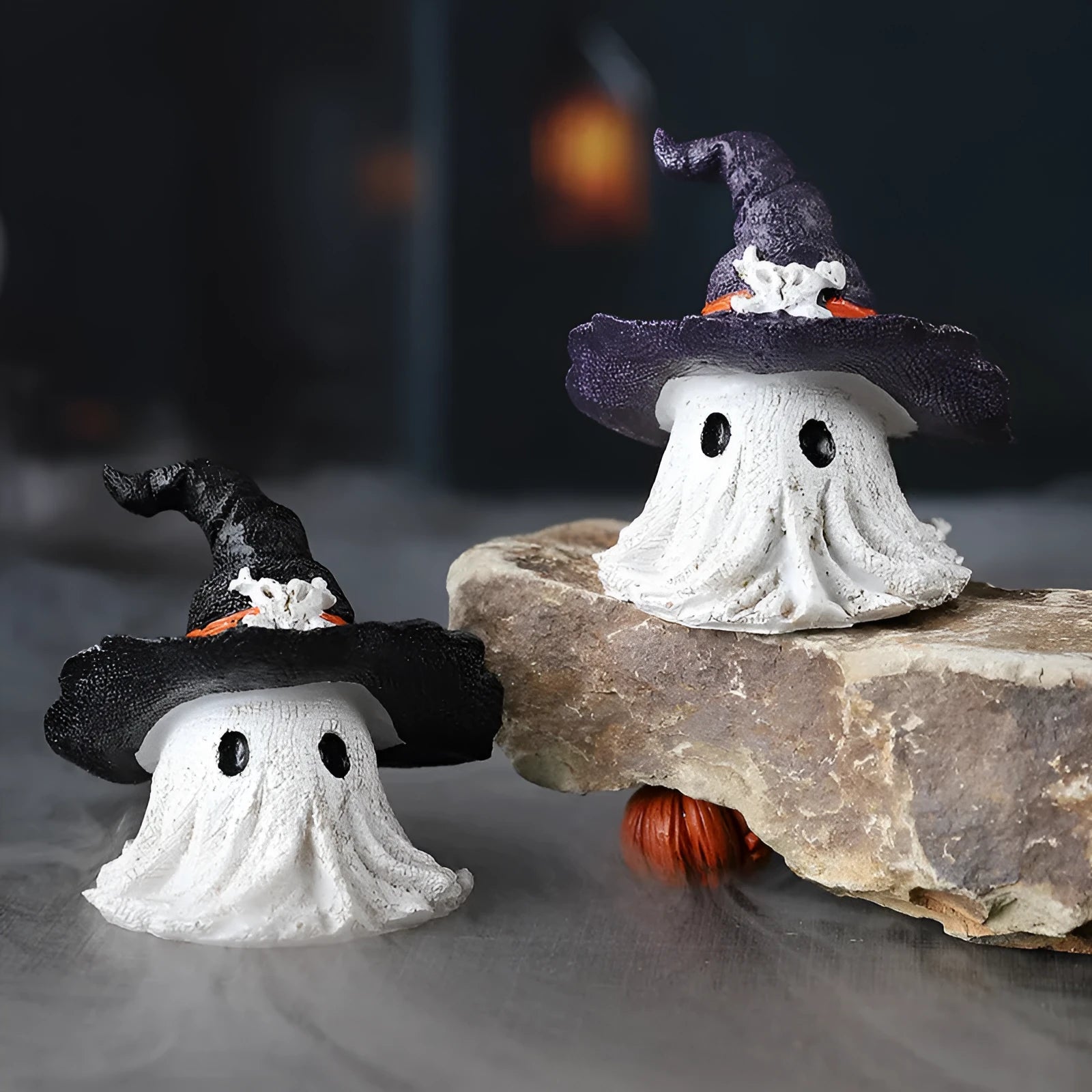 Resin wizard hat ornament in black and purple colours for seasonal decorations
