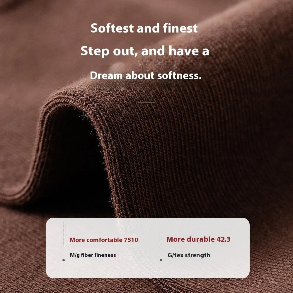 Men's mid-calf combed cotton socks in solid colours like army green, beige, and black on a white background.