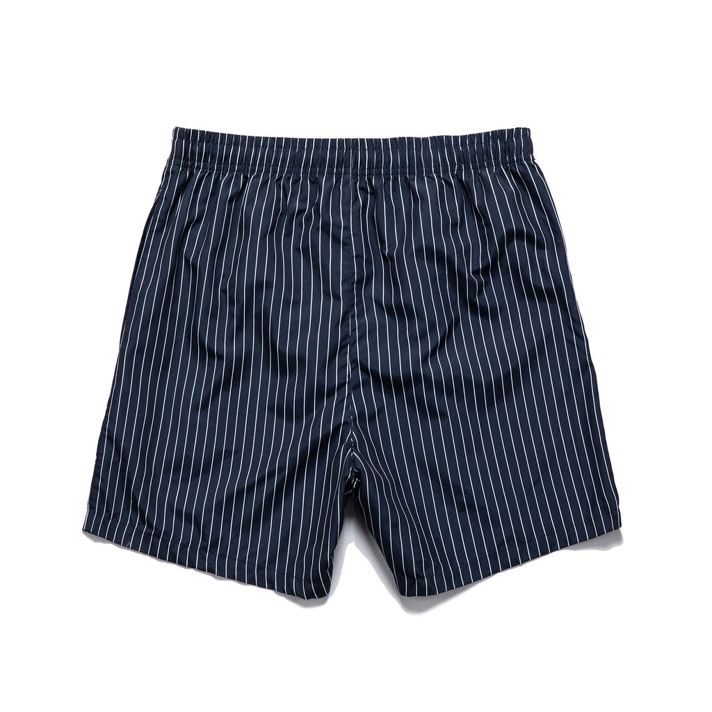 Men's navy blue and grey striped polyester beach shorts with straight leg opening.