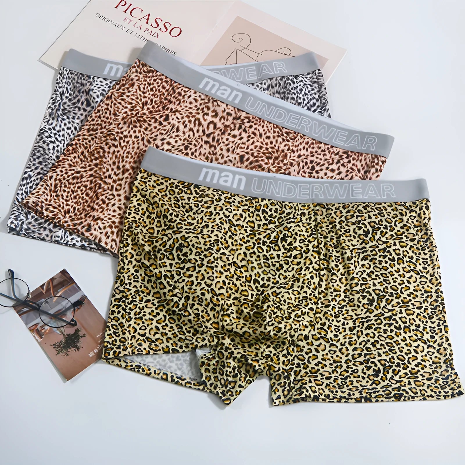 Men's leopard print loose underwear in polyester milk silk fabric showing mid-waist cut