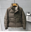 Men's stand collar thick down jacket in solid black colour on a plain background