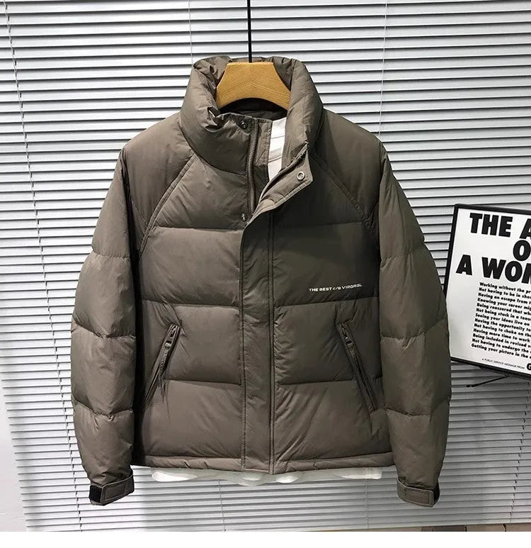Men's stand collar thick down jacket in solid black colour on a plain background