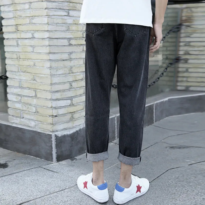 Men's loose straight harem style jeans in black or blue cotton fabric