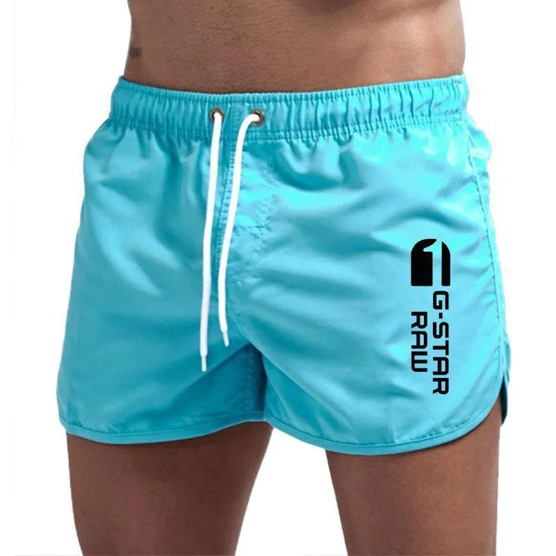 Man wearing thin polyester hemp blend beach shorts in fluorescent green, suitable for sports.