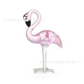 Pink crystal flamingo decorative ornament on table with modern simple design